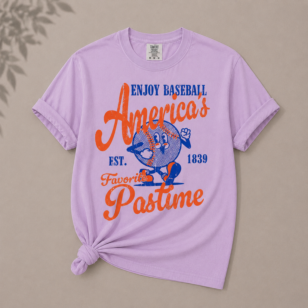 Purple t-shirt with baseball-themed graphic and text on a beige background