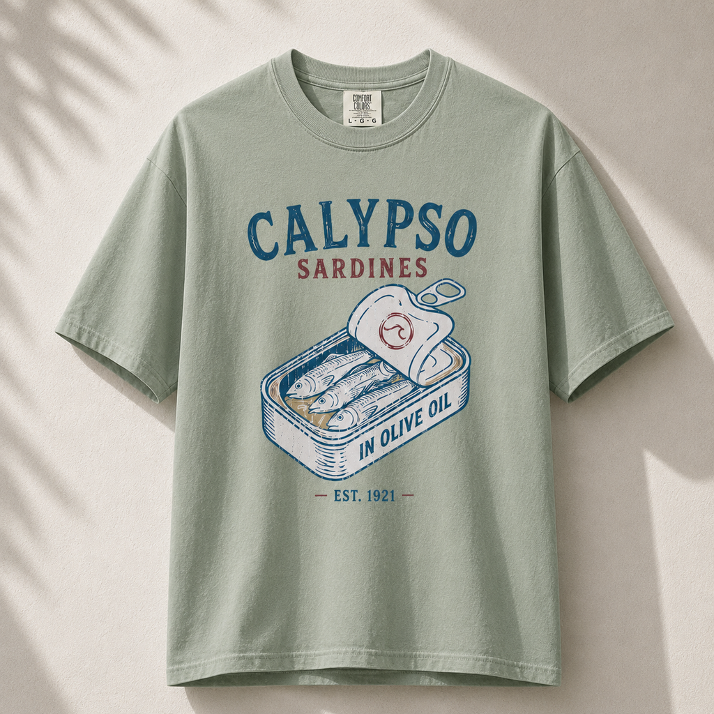 Green t-shirt with Calypso Sardines graphic on a beige background