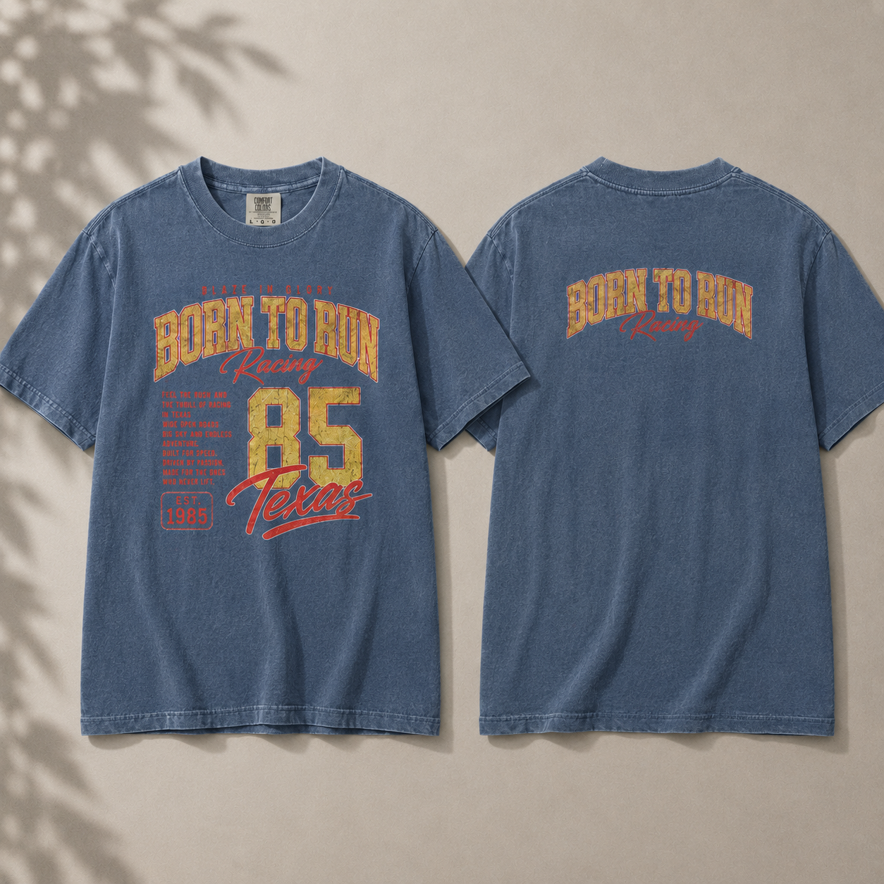 Blue t-shirt with 'Born to Run Racing' text on a beige background
