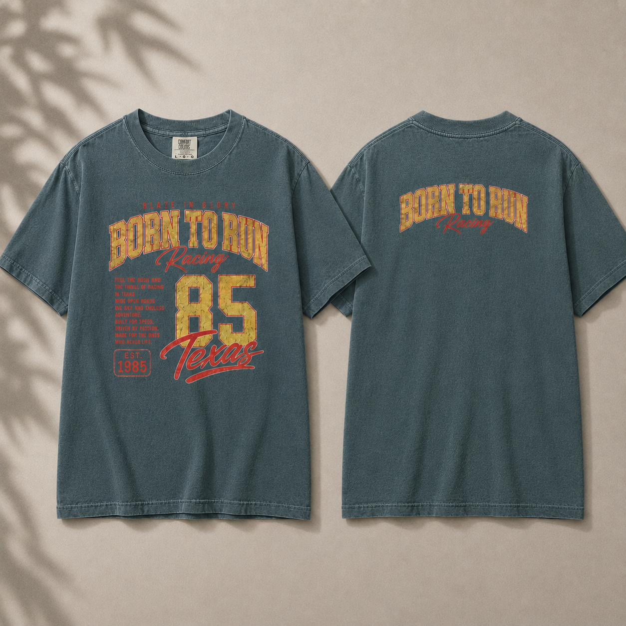 Blue t-shirt with 'Born to Run Racing' text on a beige background