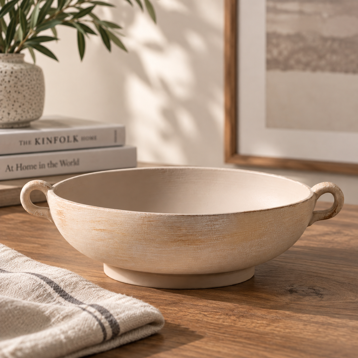 Empty distressed stoneware decorative bowl on wood table