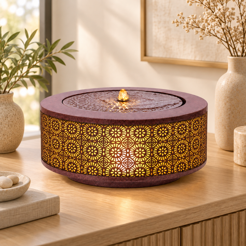 Illuminated tabletop fountain styled in a calm indoor home setting