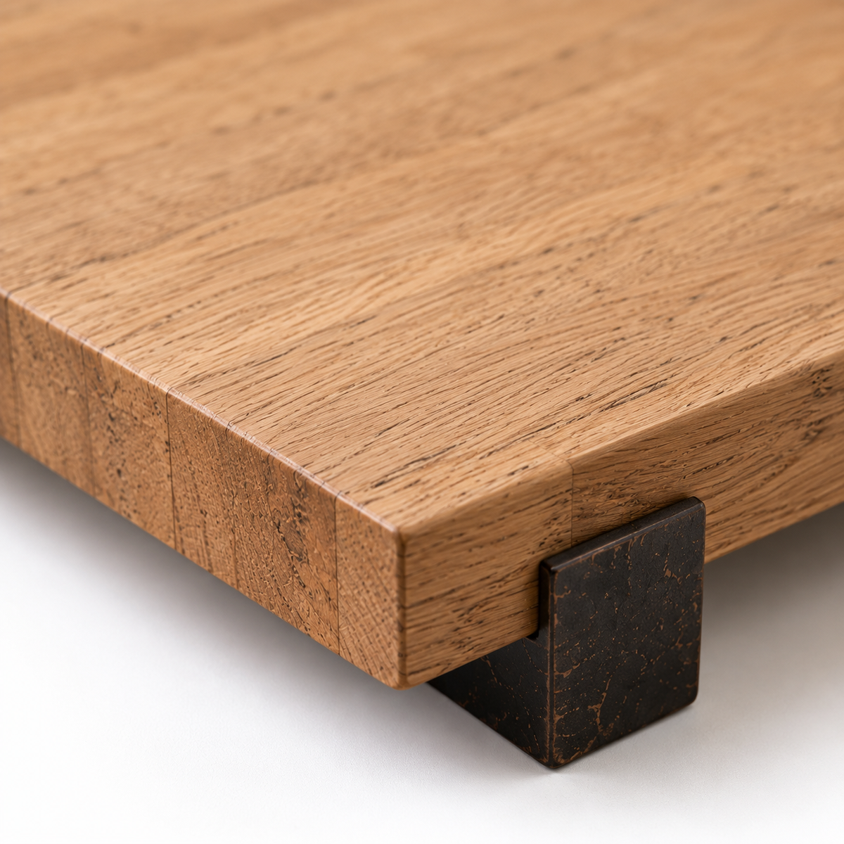 Close-up of natural wood grain and dark riser foot