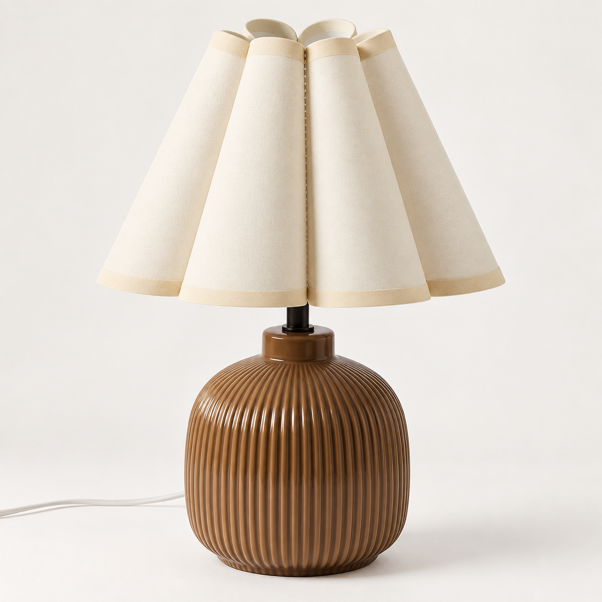 Scalloped ceramic accent table lamp with brown ribbed base and cream shade