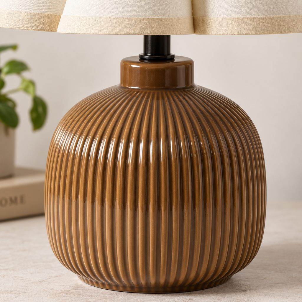 Close-up of the ribbed brown ceramic base of the accent lamp