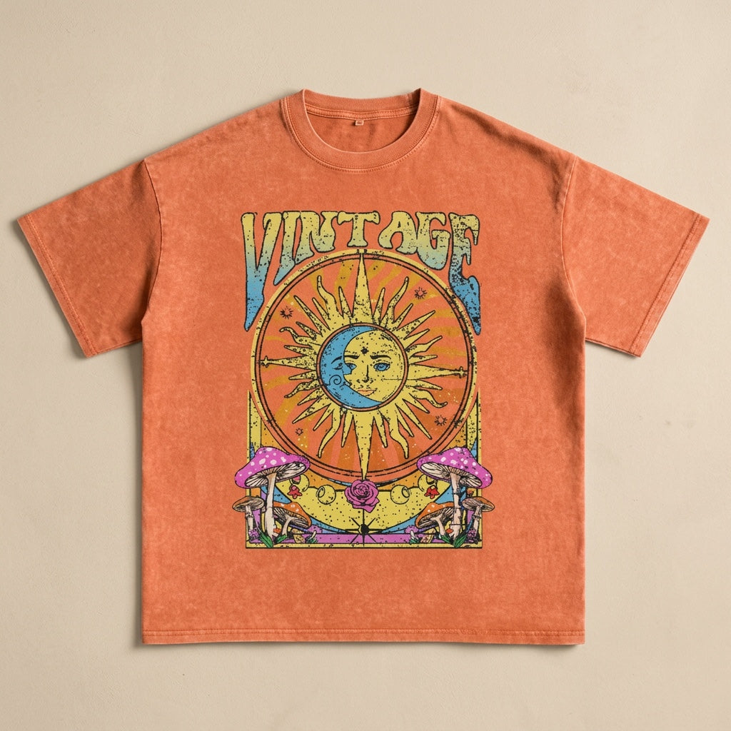 Orange vintage washed oversized t-shirt with celestial sun and moon graphic
